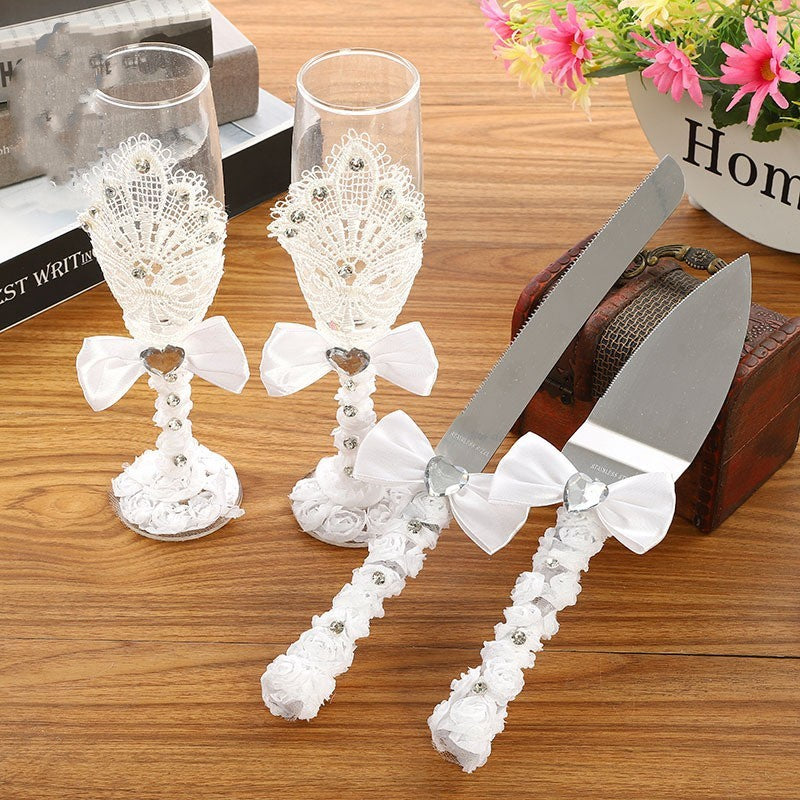 Four Piece Set Of Wine Glasses Knives And Forks