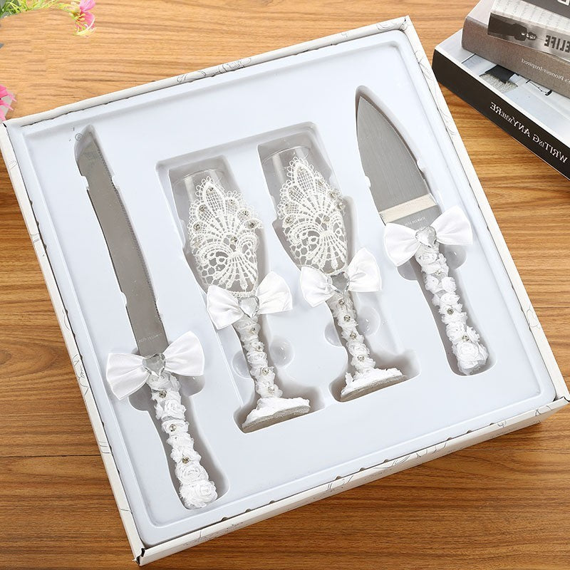 Four Piece Set Of Wine Glasses Knives And Forks