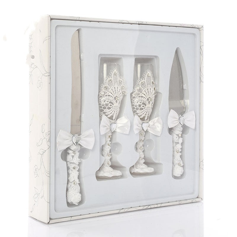 Four Piece Set Of Wine Glasses Knives And Forks