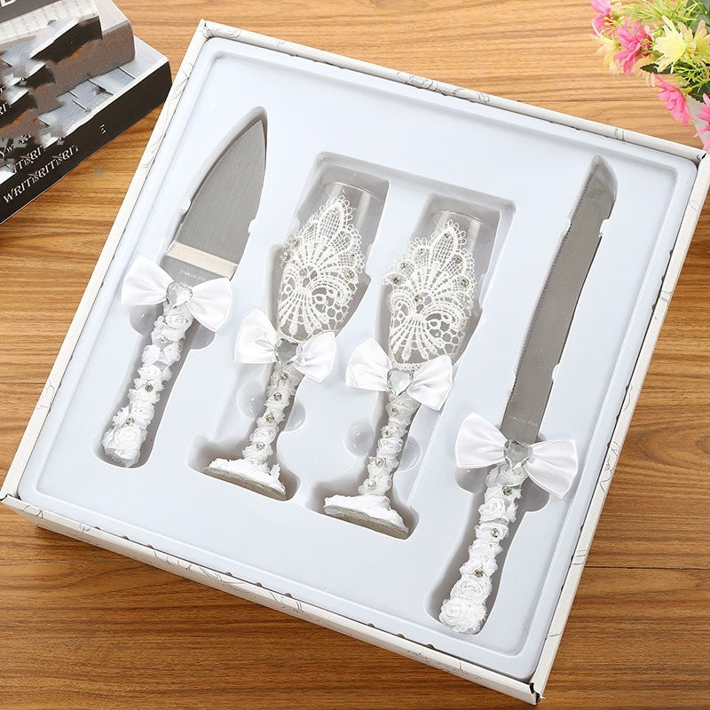 Four Piece Set Of Wine Glasses Knives And Forks